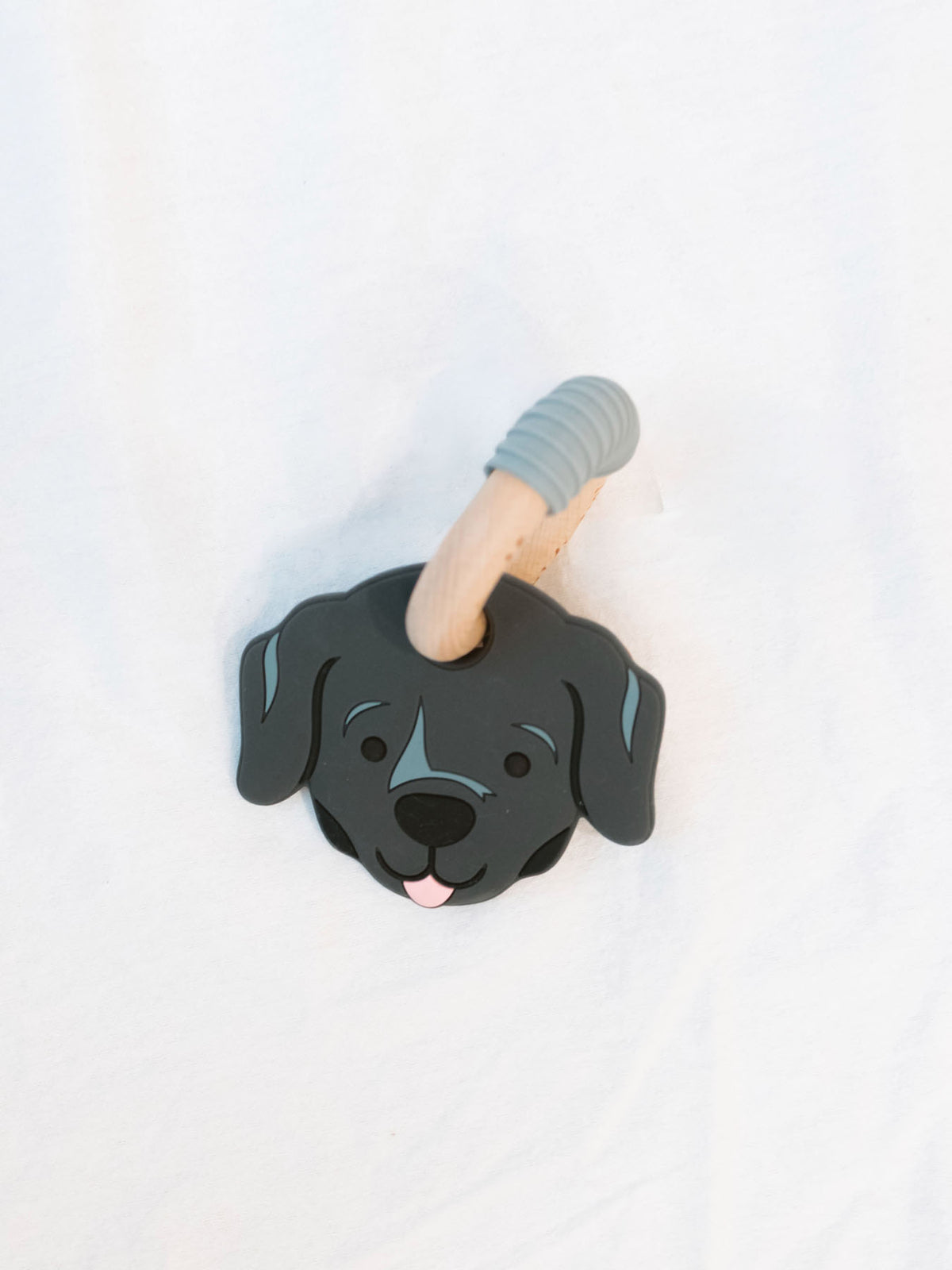 black lab teether for babies on a white background