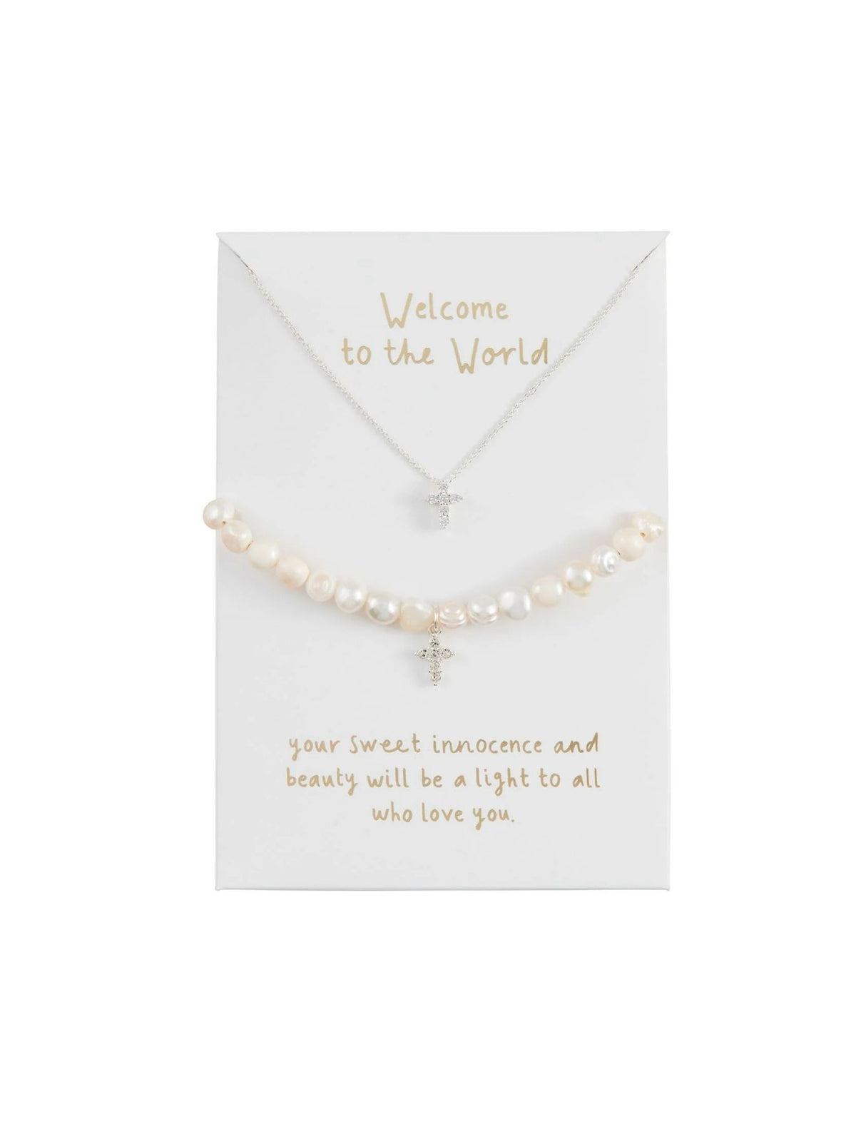 Cross necklace and bracelet on a white background