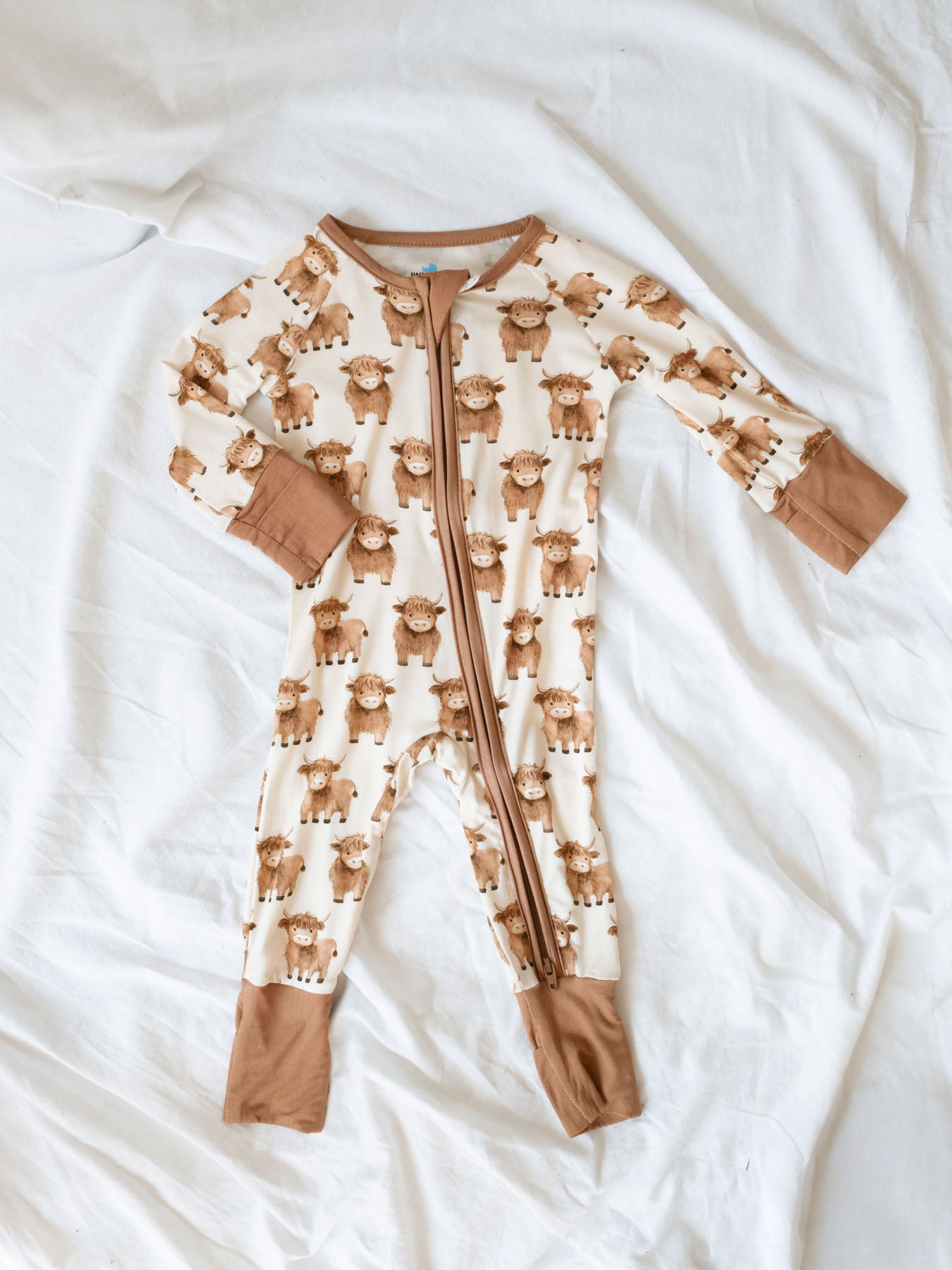 bamboo sleeper pajama with highland cows for babies and infants