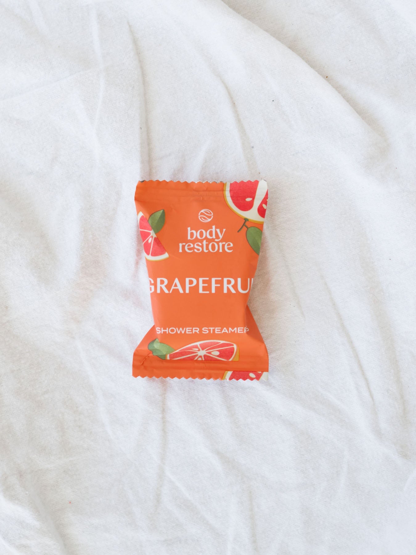 Natural Grapefruit shower steamer Made with natural essential oils and clean ingredients. Step into the aromatic steam, inhale deeply, and enjoy a refreshing, spa-like experience.