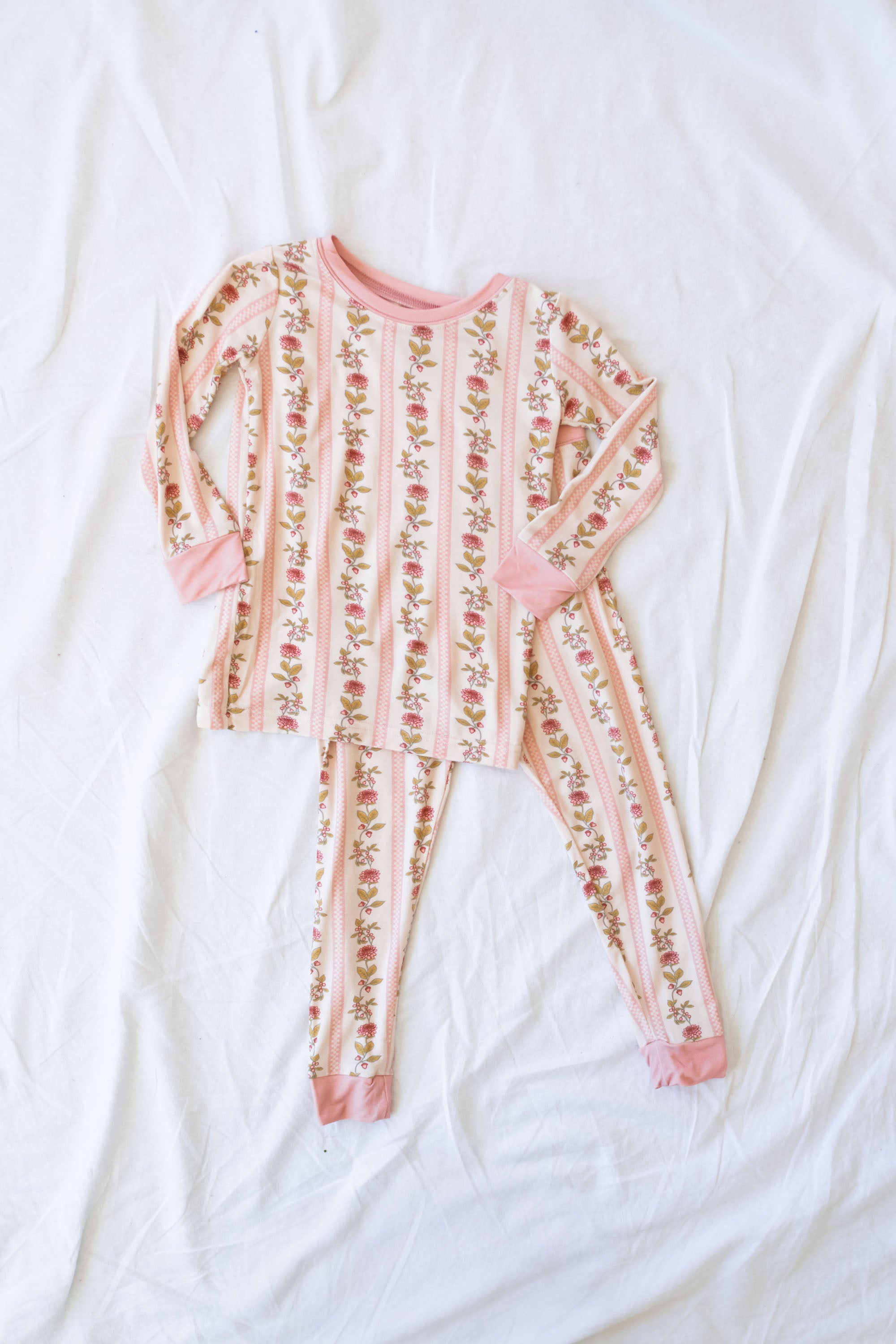 Experience ultimate comfort with our buttery-soft, breathable bamboo pajamas designed for sensitive skin. This eco-friendly, tag-less set features a safe, snug fit and incredible stretch for peaceful nights and cozy mornings.
Vintage Floral Stripe