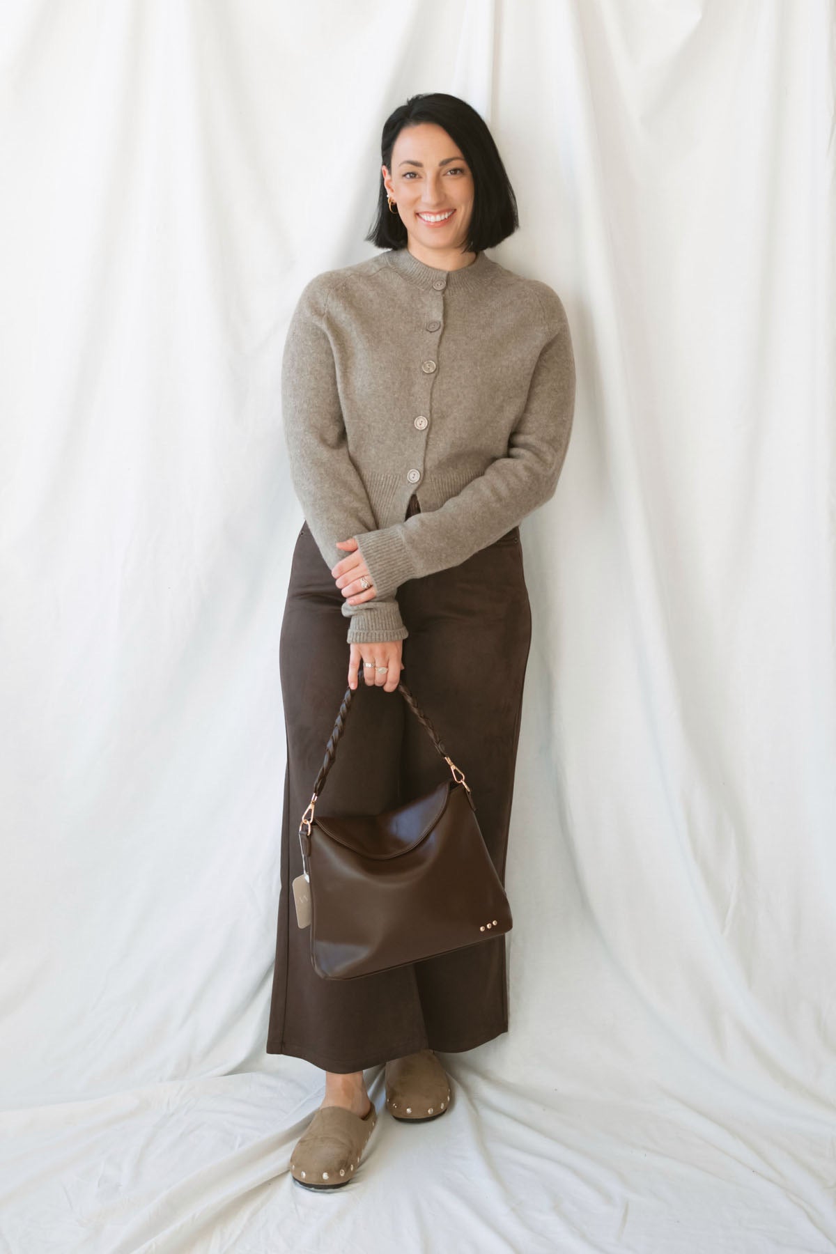 Donna women's Taupe sweater cardigan featuring a classic round neckline, long sleeves, and neutral knit texture for casual everyday layering.