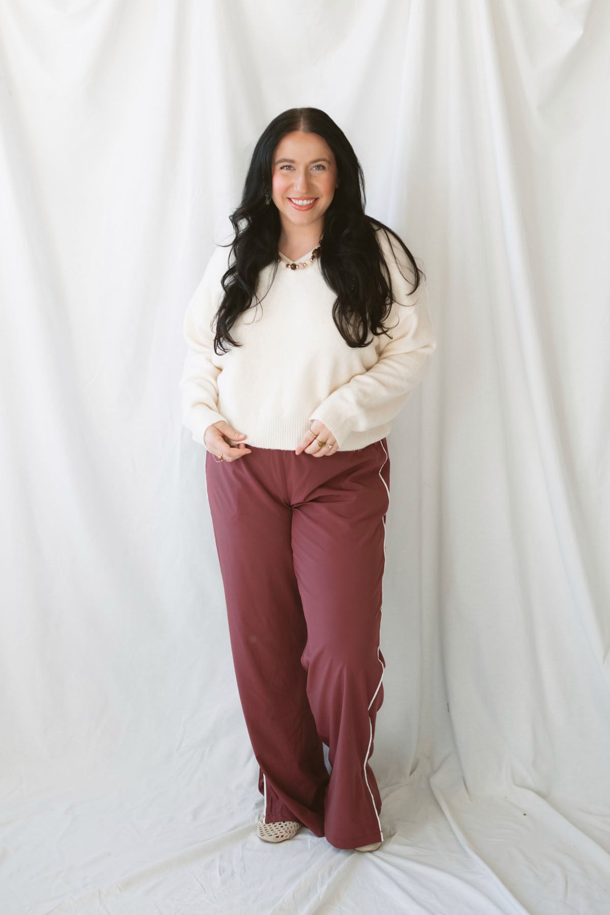 Drew Cream Brushed Knit V-Neck Pullover Sweater for women featuring a soft textured knit, classic V-neckline, and long sleeves for cozy everyday styling.