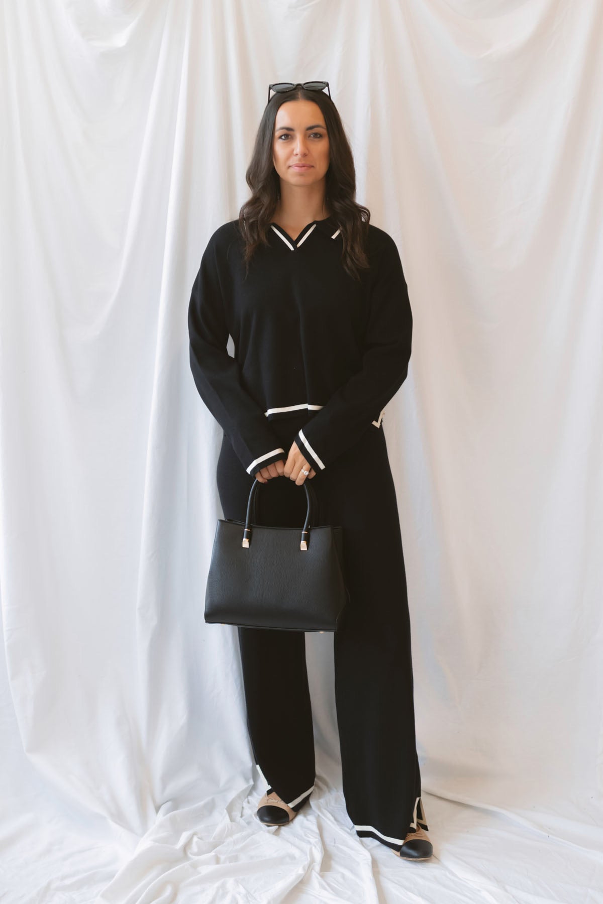 Laura Black Contrast Stripe Trim Collar Knit Sweater and Pants Set featuring a collared sweater and coordinating knit pants with contrasting stripe details.