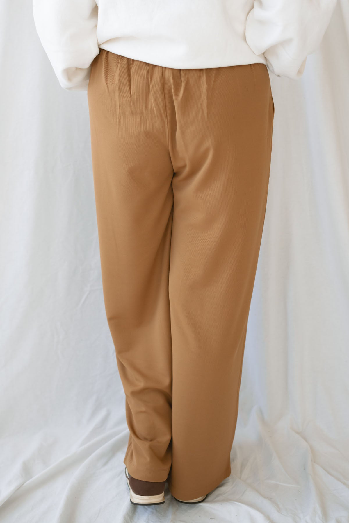 Model wearing the wide leg micro waffle textured pants.