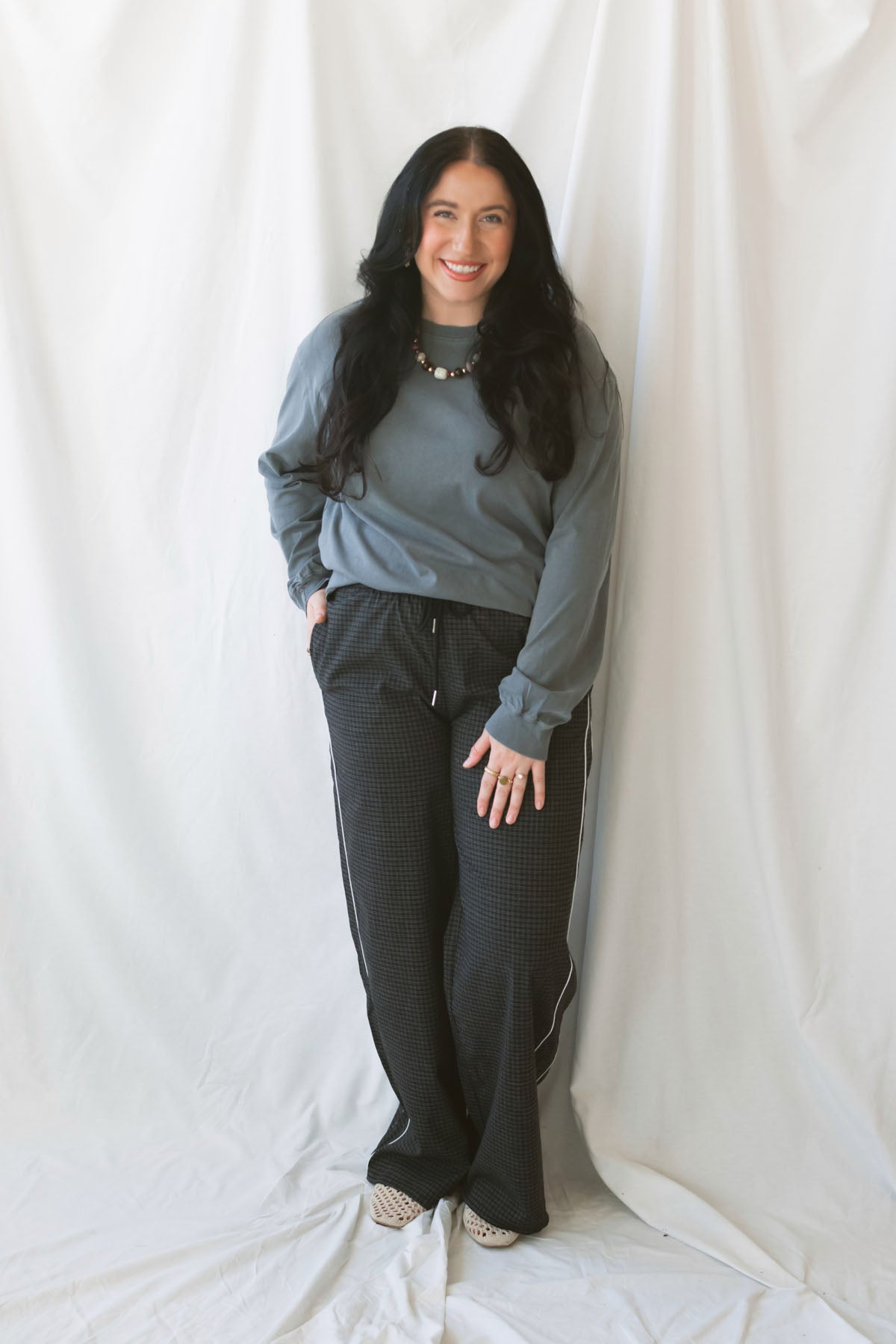 Sarah Grey Long Sleeve Garment Dye Tee for women, made from 100% cotton with a classic round neckline and casual garment-dyed finish.