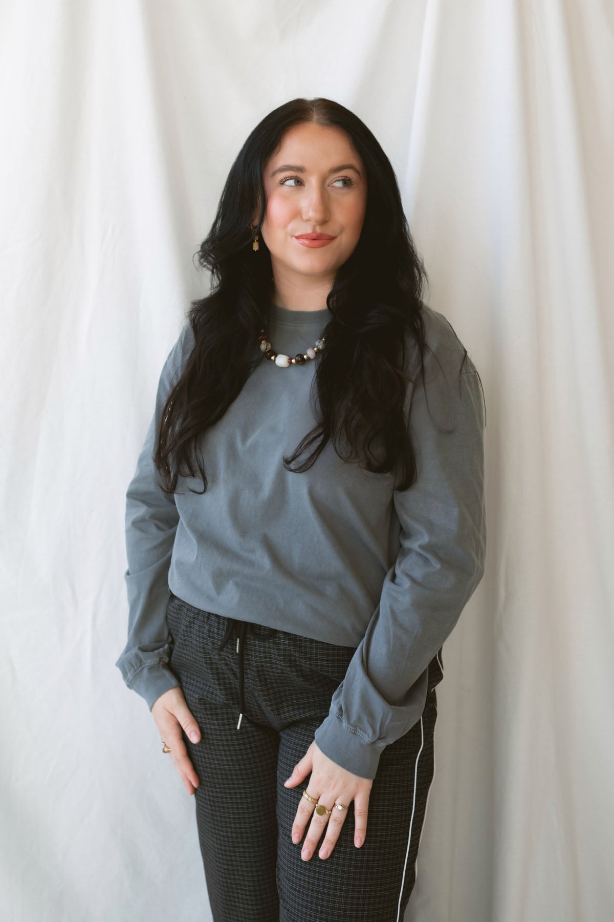 Sarah Grey Long Sleeve Garment Dye Tee for women, made from 100% cotton with a classic round neckline and casual garment-dyed finish.