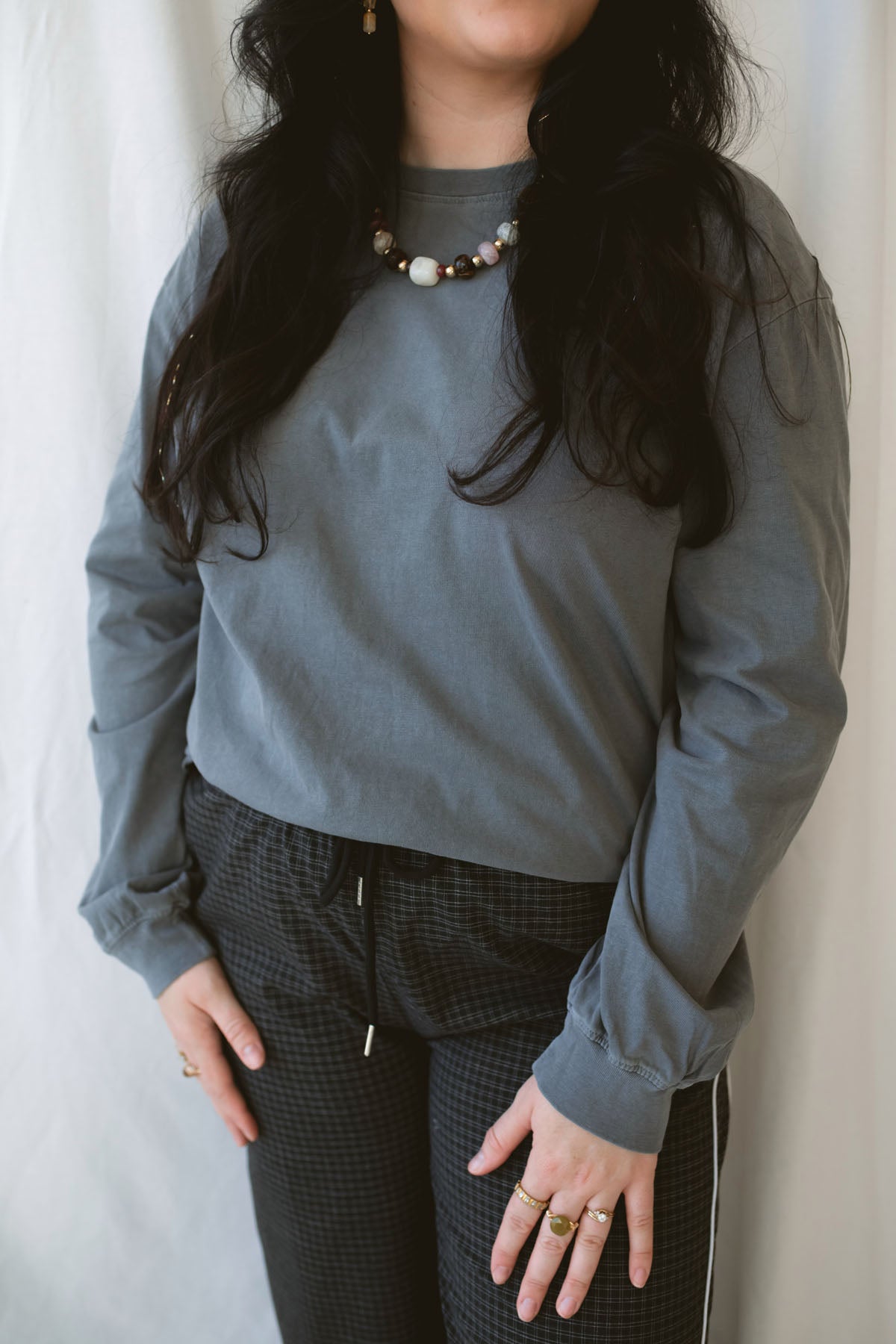 Sarah Grey Long Sleeve Garment Dye Tee for women, made from 100% cotton with a classic round neckline and casual garment-dyed finish.