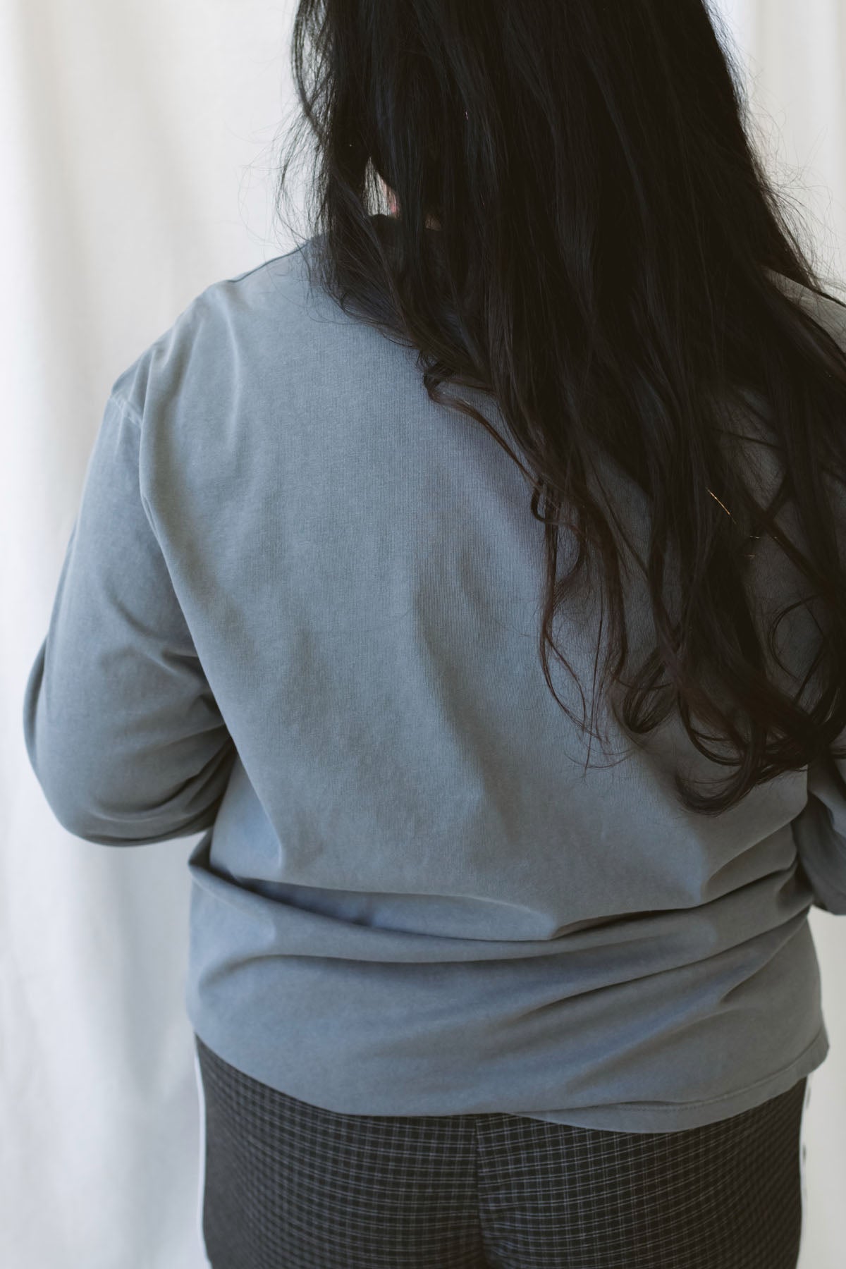 Sarah Grey Long Sleeve Garment Dye Tee for women, made from 100% cotton with a classic round neckline and casual garment-dyed finish.