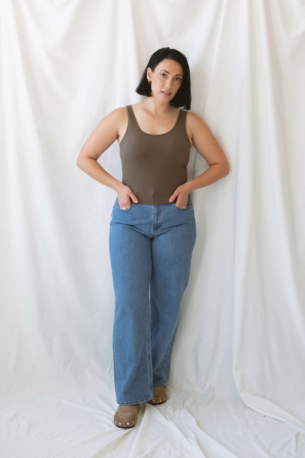 Trina Classic Seamless Ribbed Tank Top in Truffle, a women's sleeveless ribbed basic featuring a smooth seamless design and rich earthy neutral color.