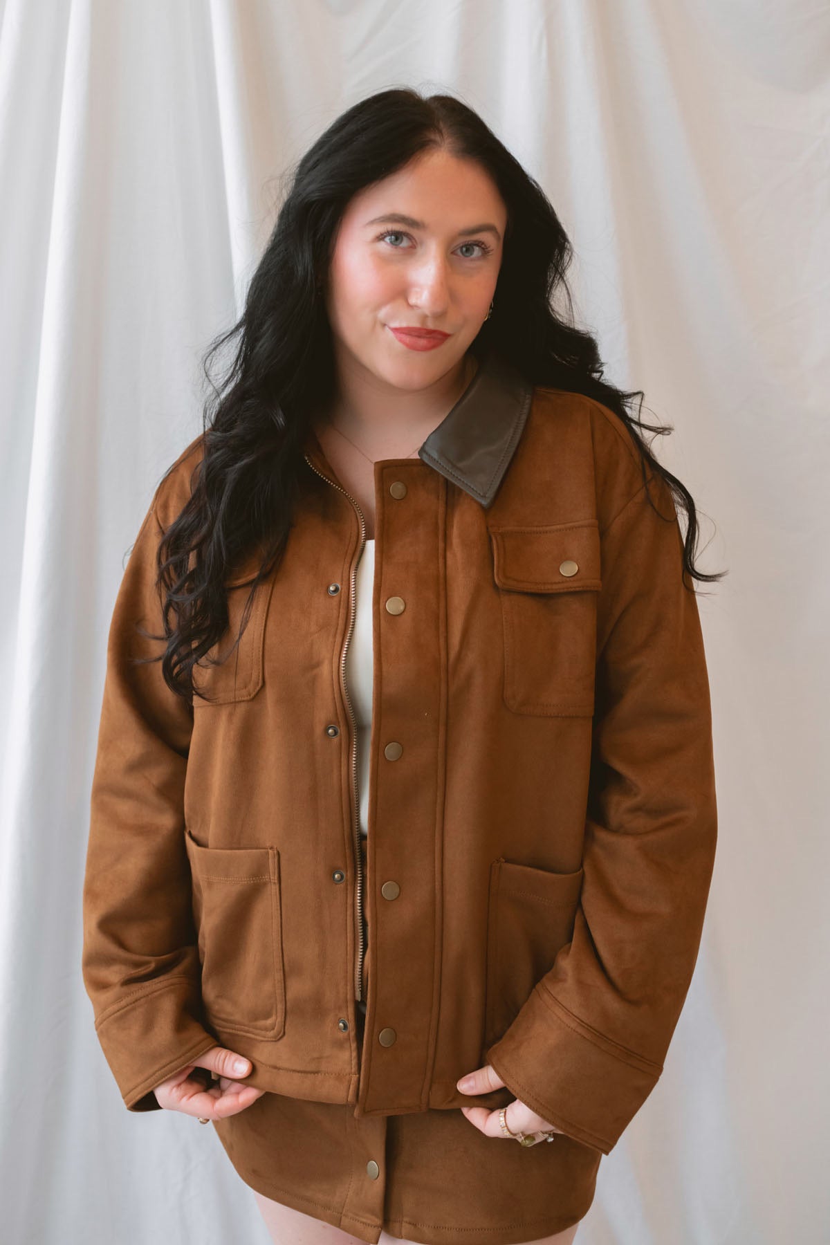 Rosalie Suede Jacket in Cognac featuring a contrasting faux leather collar and snap-front closure.