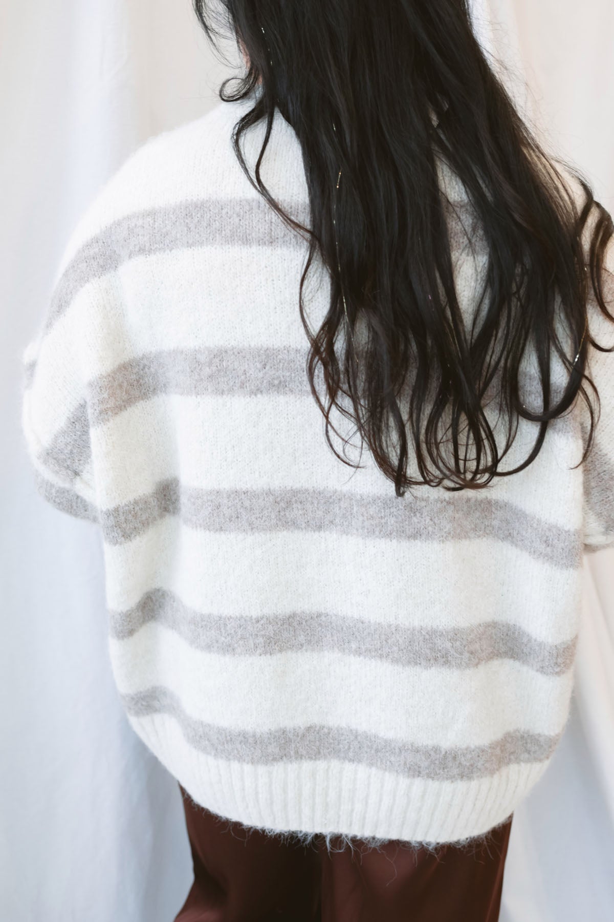 Cream fuzzy knit sweater for women featuring a classic striped pattern, relaxed boyfriend fit, and cozy textured finish for casual fall and winter styling.