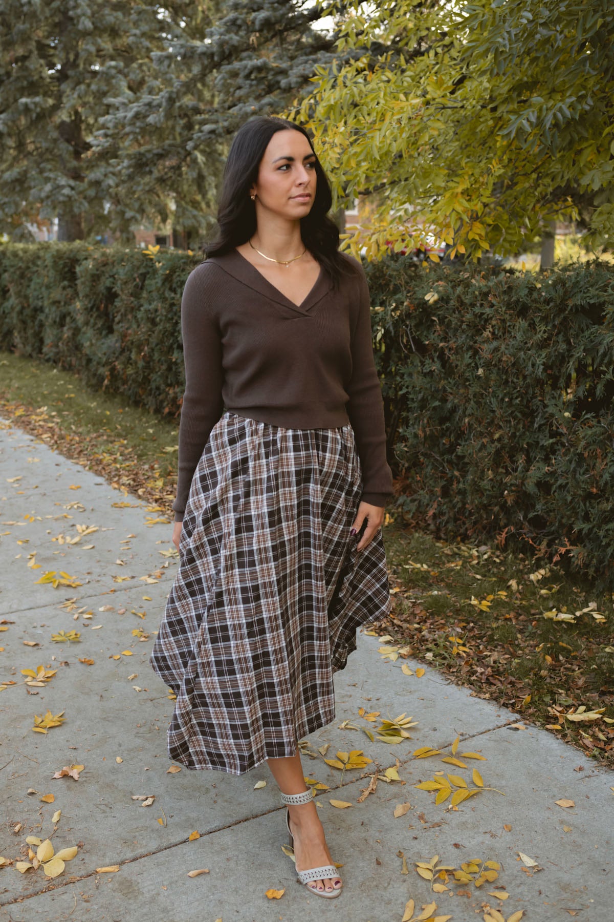 Ronny chocolate brown long sleeve ribbed knit top with an open collar neckline.