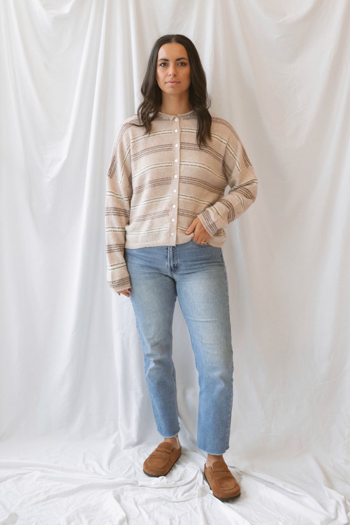 Krista Striped Sweater Cardigan in Beige Multi with classic neutral stripes and rolled-edge details.