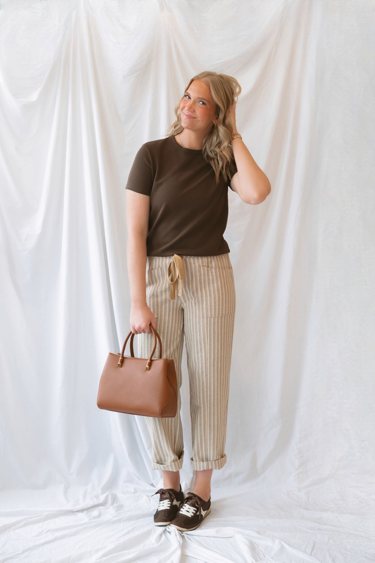 Steph Striped Wide Leg Drawstring Pants in Warm Sand Stripe featuring a relaxed silhouette and neutral striped pattern.
