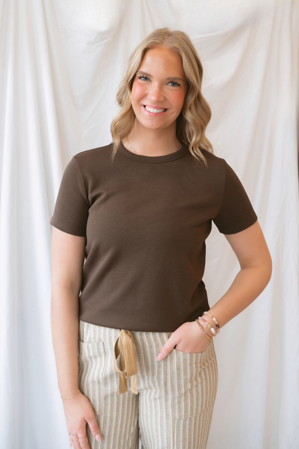 Kelly Short Sleeve Round Neck Soft Knit Jersey Top in brown, a versatile neutral basic for everyday outfits and layering.