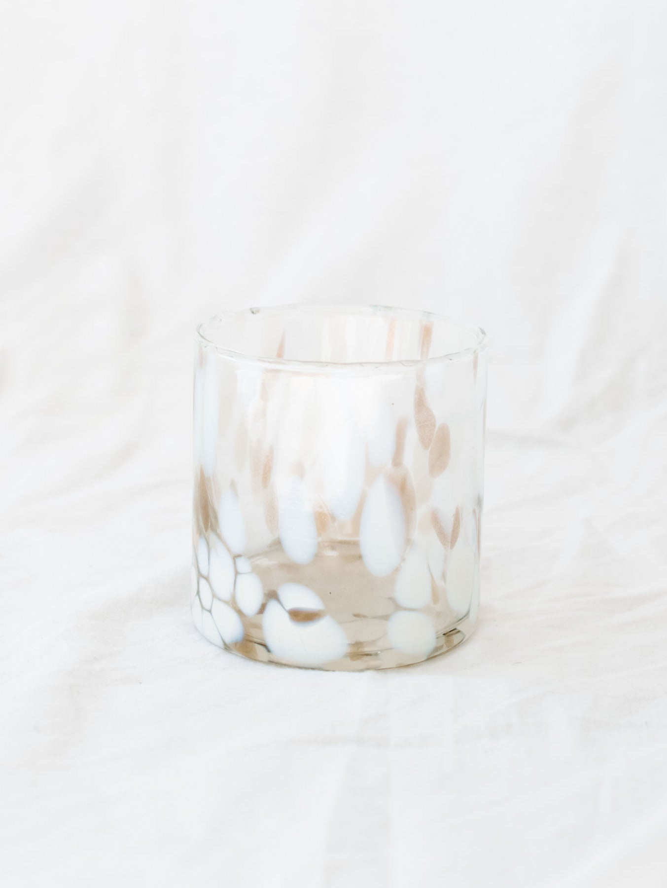 Side view of the speckled straight sided jar