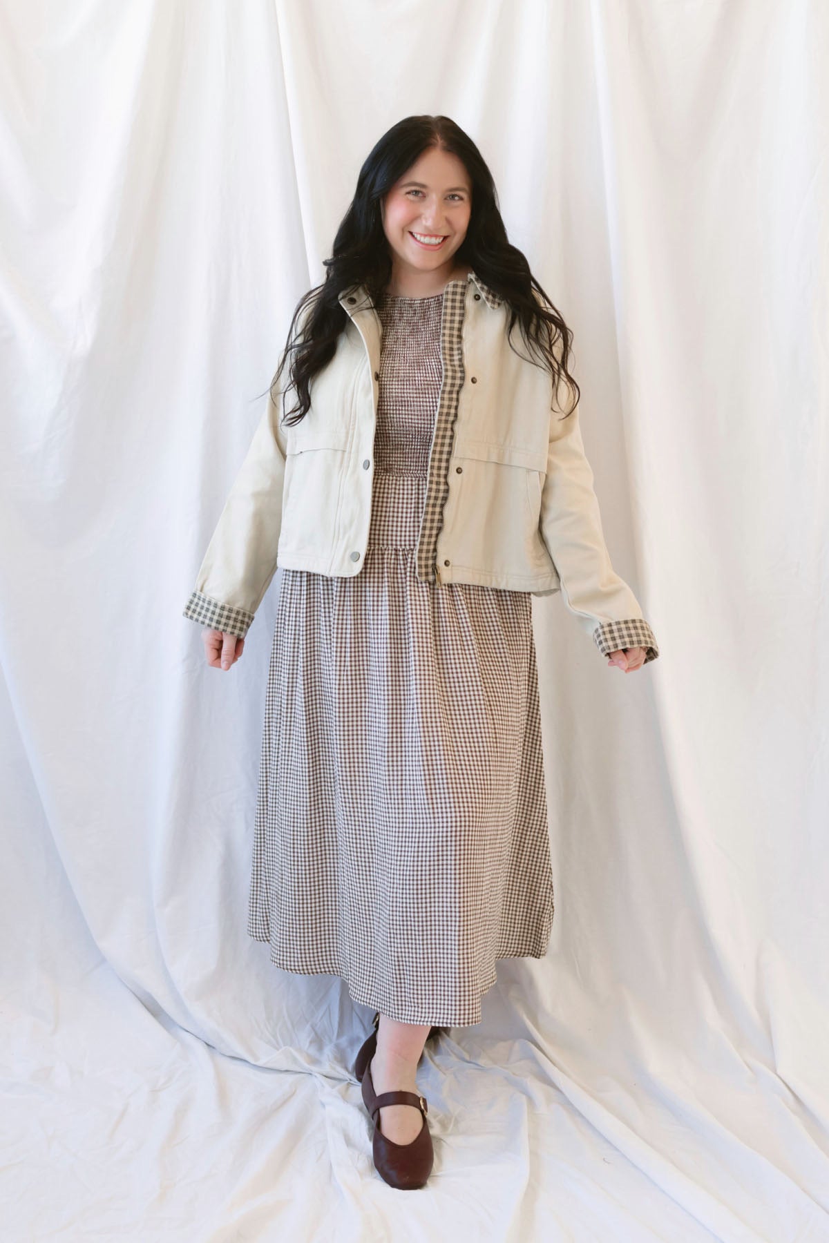 Willow brown gingham sleeveless midi dress with a smocked bodice and tiered skirt.