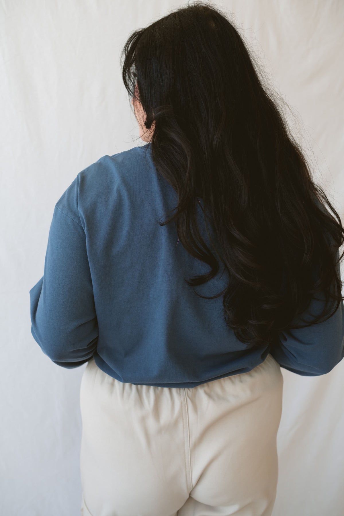 Sarah Navy Long Sleeve Garment Dye Tee for women, made from 100% cotton with a classic round neckline and casual garment-dyed finish.