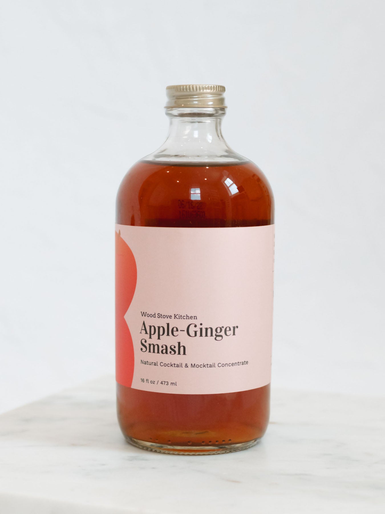 Apple Ginger Smash on a marble tray with a white background 