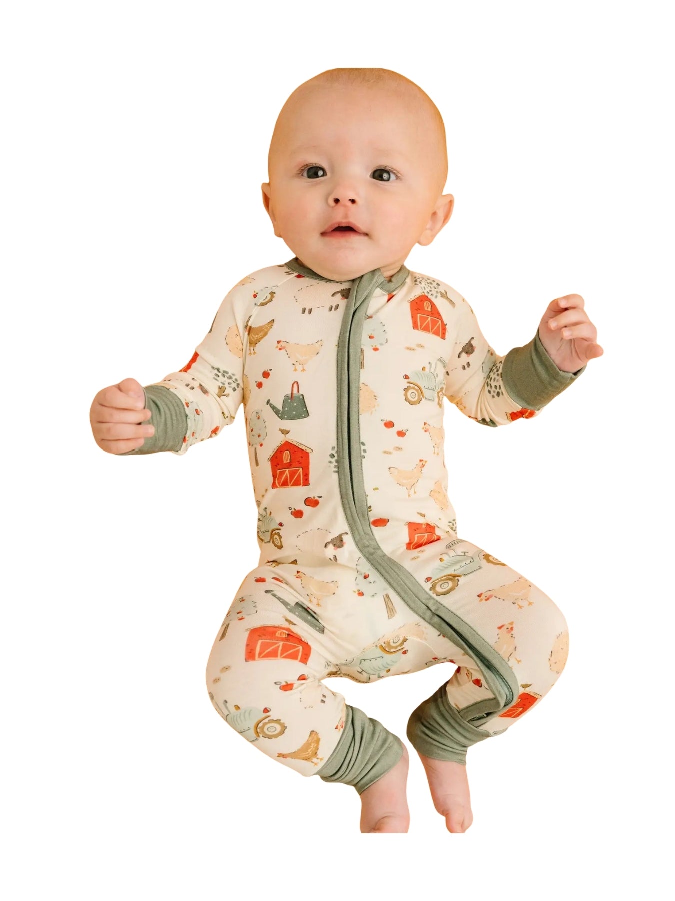 baby wearing the bamboo pajama sleeper with farm theme print 