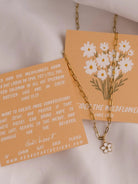 A thoughtful and encouraging necklace as a daily reminder for yourself or as a gift for someone in your life. This necklace is 14kt gold plated necklace with simple flower design and comes with a verse reference card.