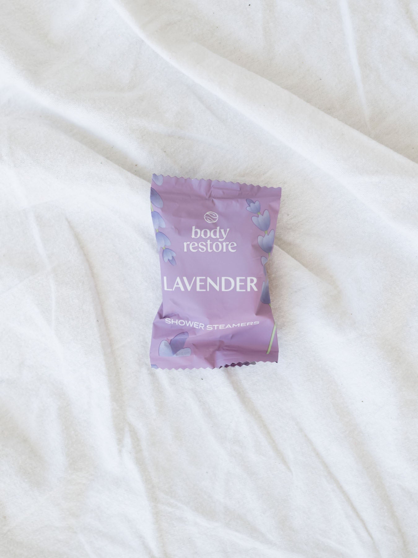 Lavender shower steamer Made with natural essential oils and clean ingredients.  Step into the aromatic steam, inhale deeply, and enjoy a refreshing, spa-like experience.