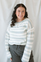 Model wearing the textured striped oversized sweater. Lightweight enough to wear now and into the next season. 
