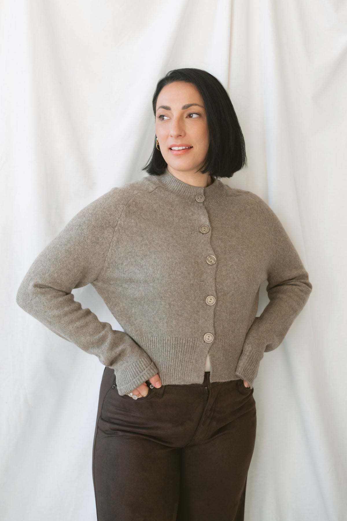Donna women's Taupe sweater cardigan featuring a classic round neckline, long sleeves, and neutral knit texture for casual everyday layering.