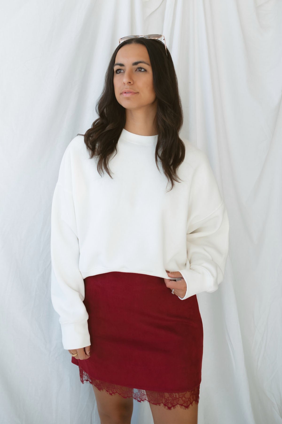 Model wearing balloon sleeve detail sweatshirt. 