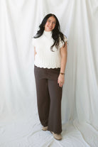Rory Ivory short sleeve turtleneck sweater vest for women, featuring a creamy neutral knit design and cozy high neckline for casual fall outfits.