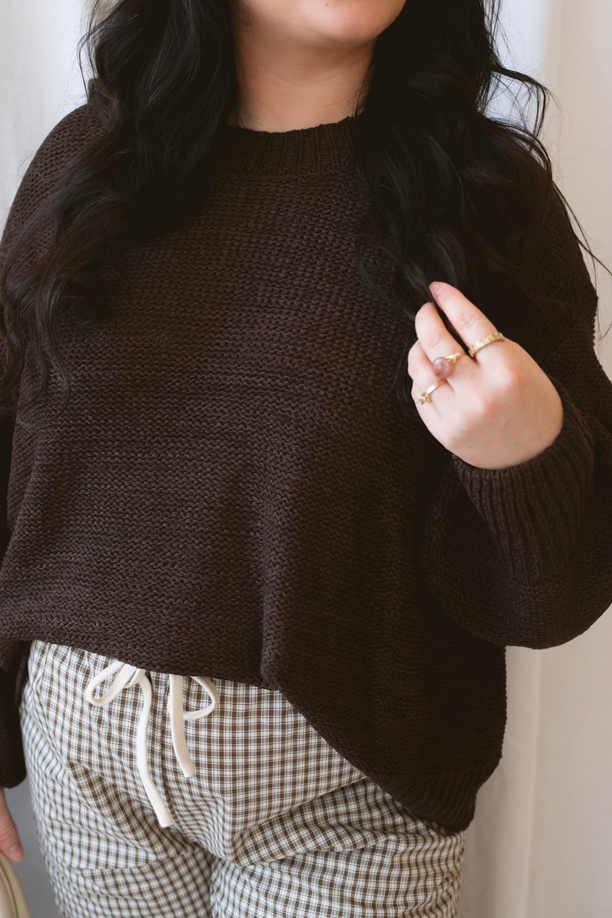 Teddi dark brown oversized sweater featuring a relaxed silhouette and statement balloon sleeves.