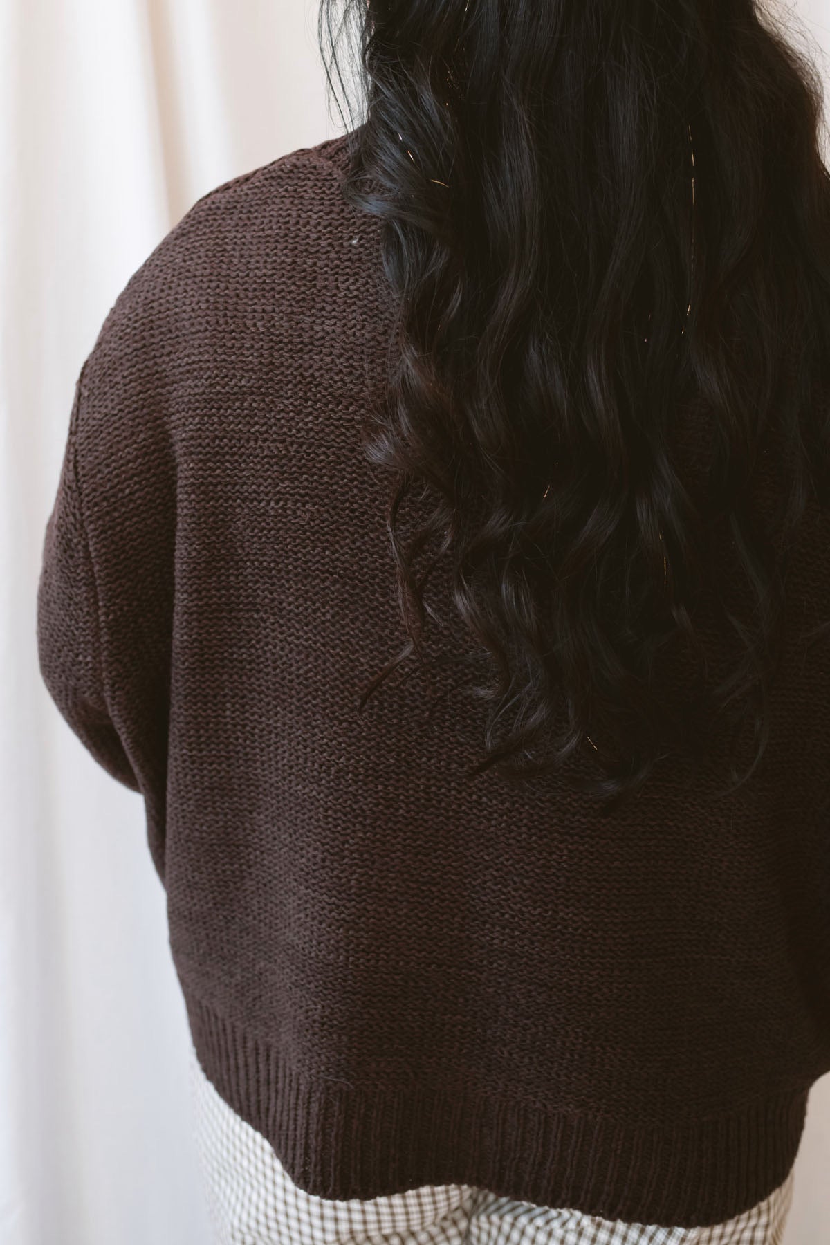 Teddi dark brown oversized sweater featuring a relaxed silhouette and statement balloon sleeves.