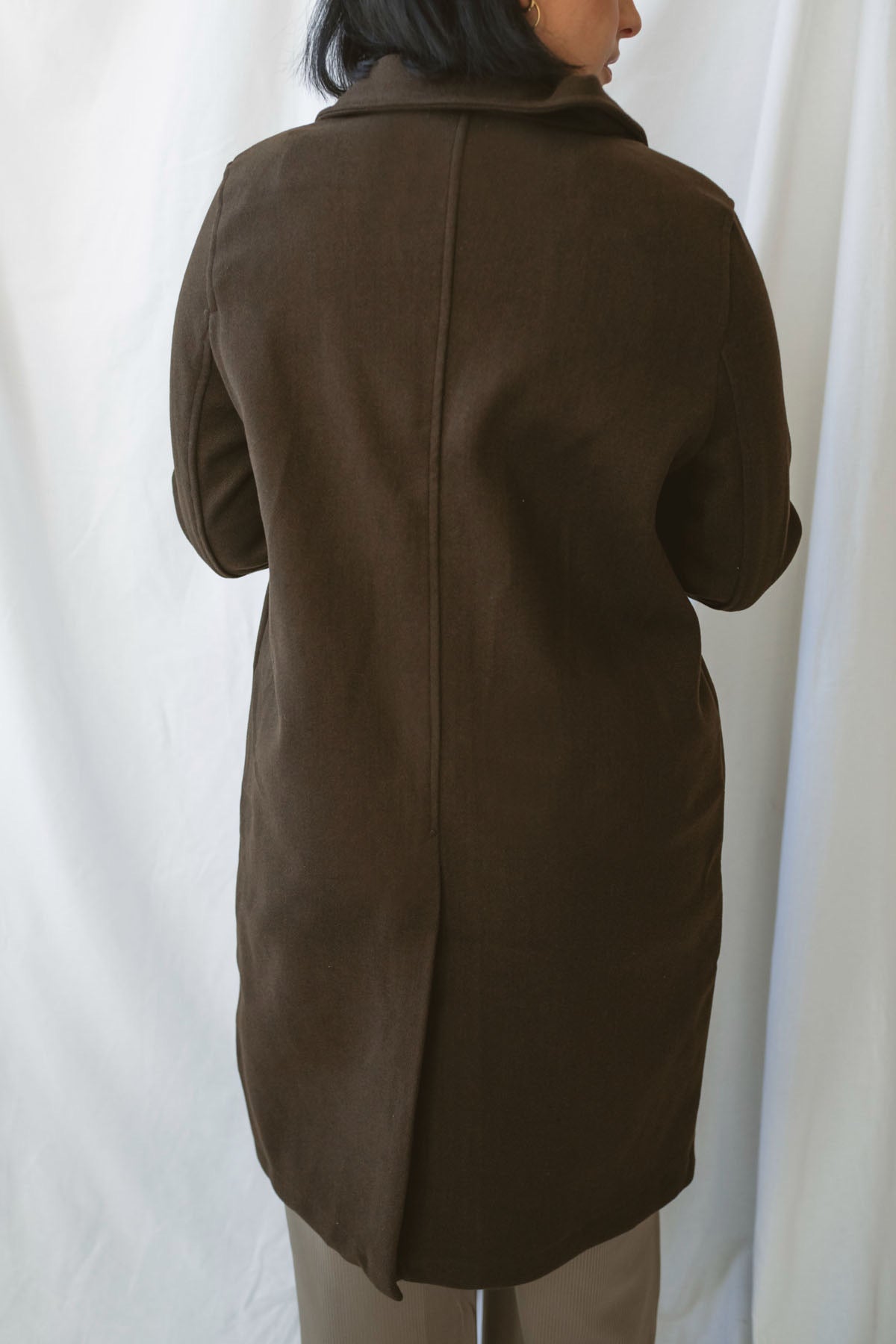 Carrie women's soft long coat in Brown featuring a classic extended-length silhouette and long sleeves for stylish fall and winter layering.