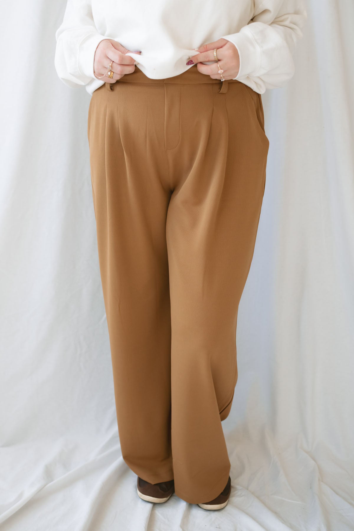 Model wearing the wide leg micro waffle textured pants. 