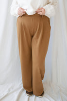 Model wearing the wide leg micro waffle textured pants. 