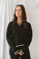 Laura Black Contrast Stripe Trim Collar Knit Sweater and Pants Set featuring a collared sweater and coordinating knit pants with contrasting stripe details.