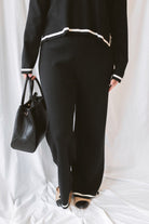 Laura Black Contrast Stripe Trim Collar Knit Sweater and Pants Set featuring a collared sweater and coordinating knit pants with contrasting stripe details.