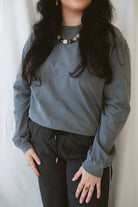 Sarah Grey Long Sleeve Garment Dye Tee for women, made from 100% cotton with a classic round neckline and casual garment-dyed finish.
