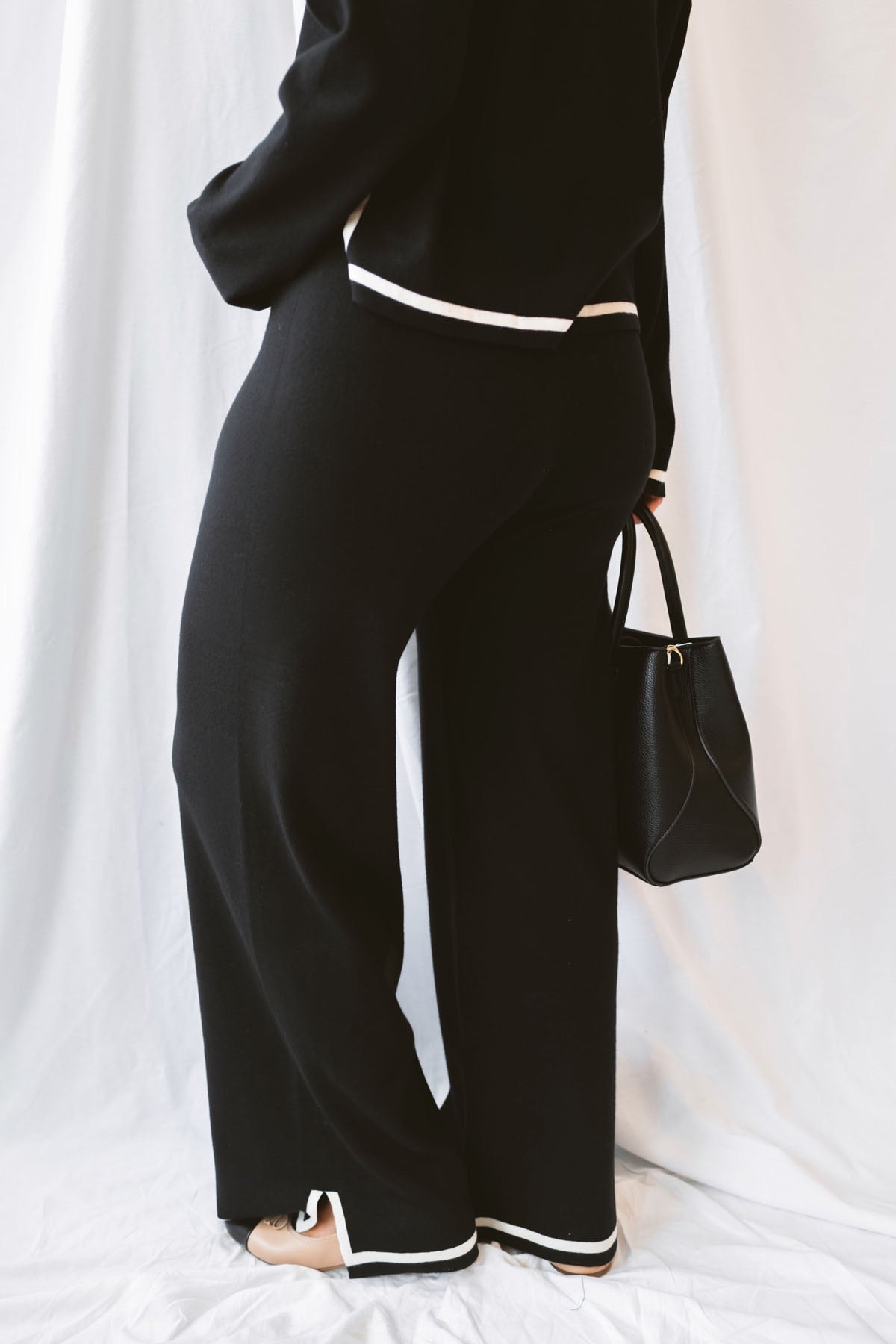 Laura Black Contrast Stripe Trim Collar Knit Sweater and Pants Set featuring a collared sweater and coordinating knit pants with contrasting stripe details.