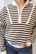 Brown striped half-zip sweater for women featuring a preppy-inspired design, classic stripe pattern, and comfortable knit silhouette for fall and winter outfits.