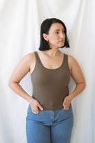Trina Classic Seamless Ribbed Tank Top in Truffle, a women's sleeveless ribbed basic featuring a smooth seamless design and rich earthy neutral color.