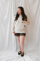 Autumn Waistband Lace Trim Hem Satin Shorts in brown with a smooth satin finish and delicate lace trim along the hem.