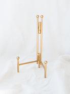 Table top straight back easel. Use to show and hold framed photos or artwork, decorative plates, cookbooks and more! 