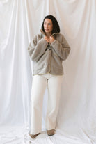 Camila Sherpa Button Up Jacket in Stone Taupe featuring a cozy textured finish and classic button-front design.