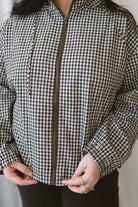 Lainey brown multi checkered hooded zip-up jacket with a relaxed everyday fit.