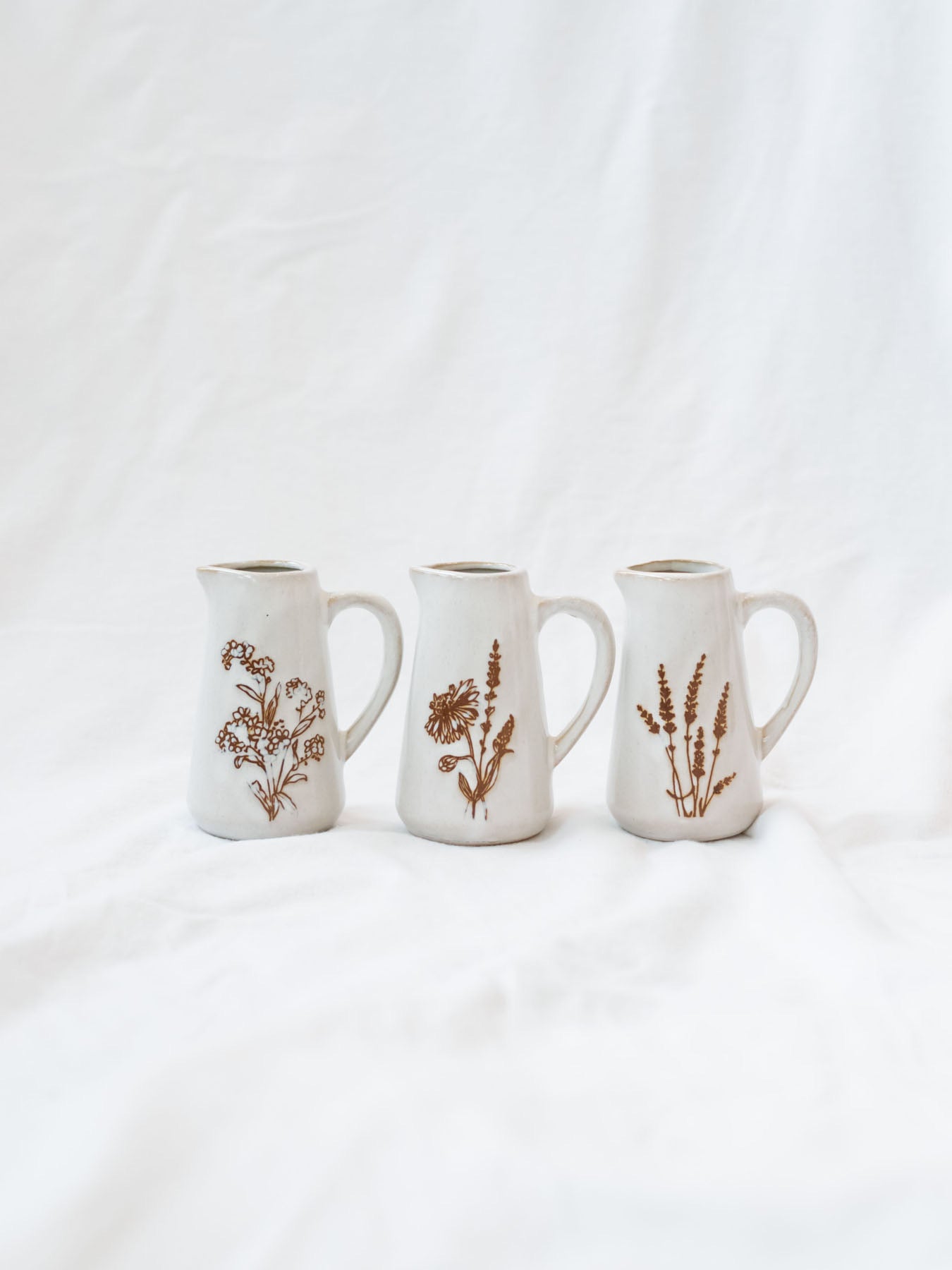 Style 1,2,& 3 of the mini floral pitches. Perfect to use as bud vase or style empty on their own or together! 