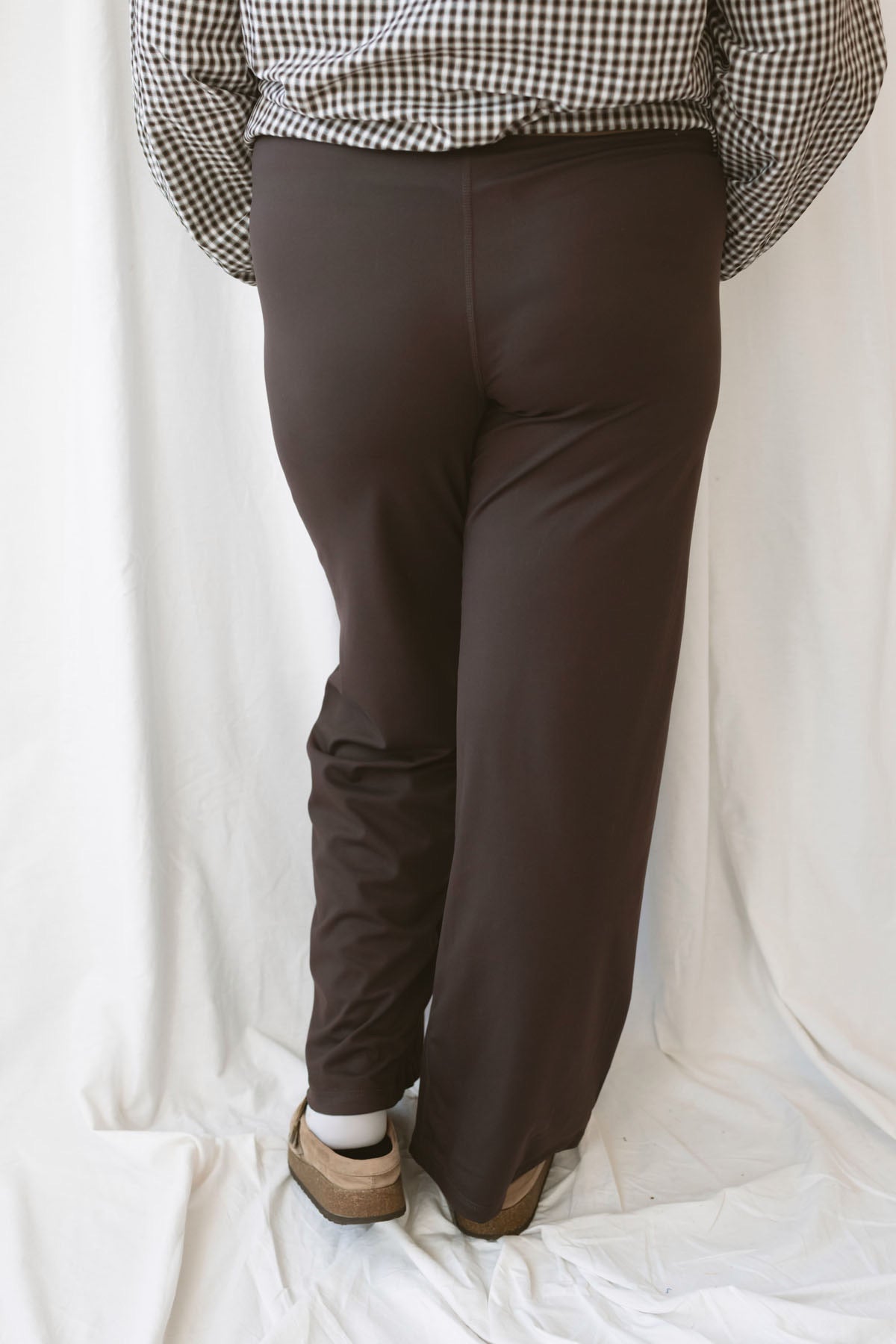 Frances Coffee Bean high waist pants with a flowing silhouette in a warm brown shade.