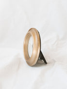 Side view of the gold edge circle photo frame. 