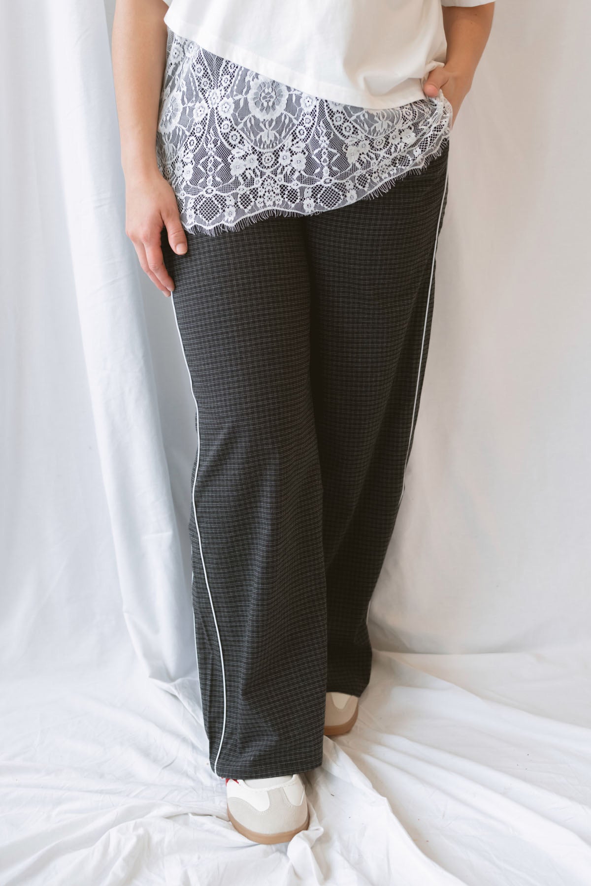 Jude Waistband with String Check Woven Long Pants in black featuring a classic check pattern and relaxed styling.